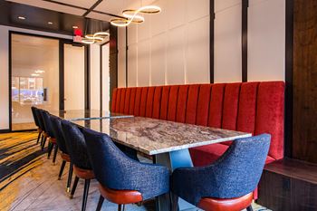 Seating for a large party in the state of the art kitchen at The Residences at Galleria, Overland Park